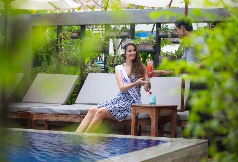 Отель The Tito Suite Residence