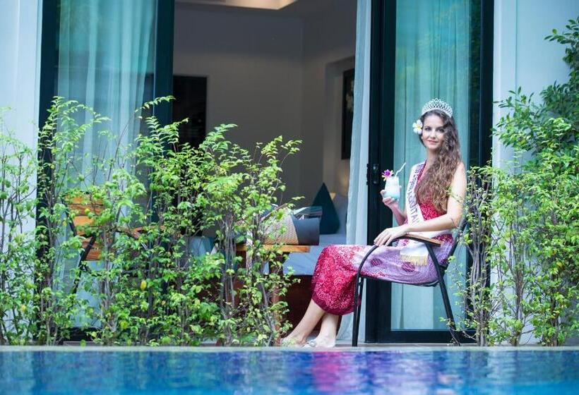 Отель The Tito Suite Residence