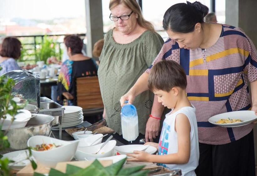 Отель The Tito Suite Residence