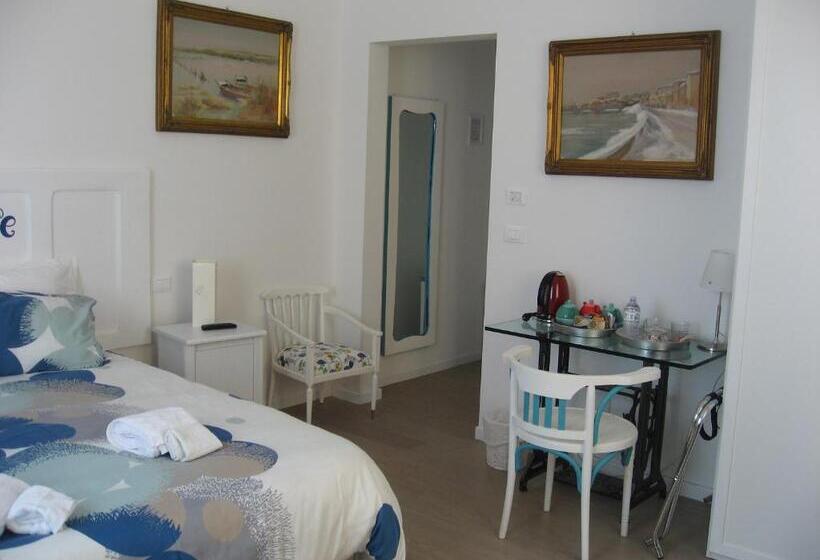 تختخواب و صبحانه Ramo Rosso Di Paolo Natalini