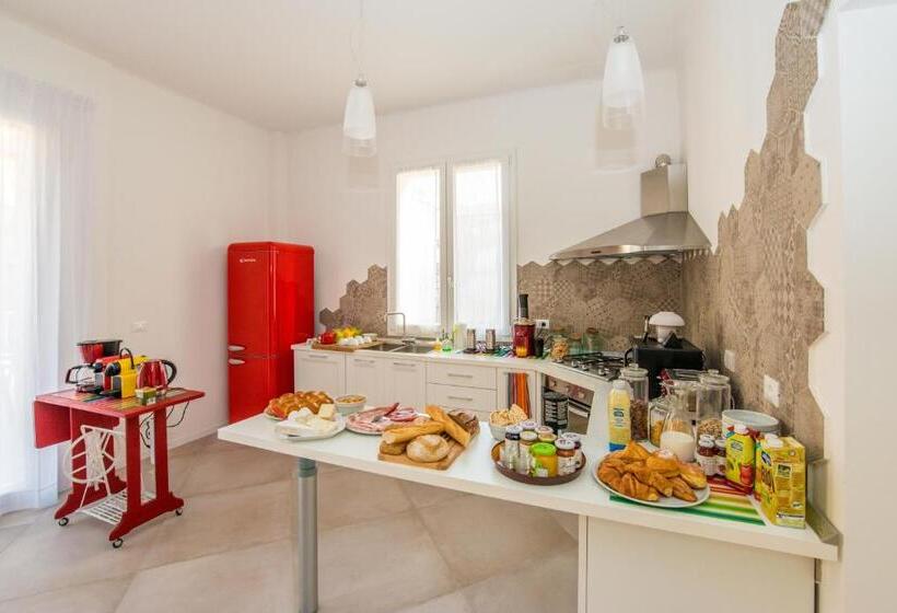 تختخواب و صبحانه Ramo Rosso Di Paolo Natalini