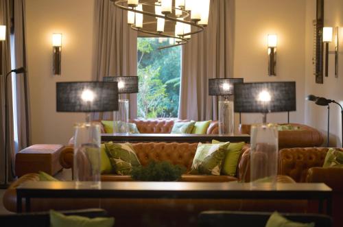 Отель Guamini Mision