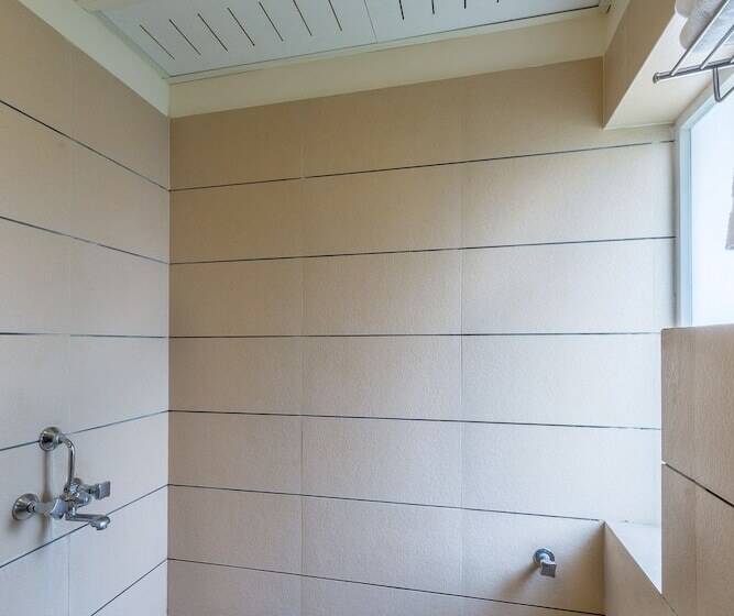 Отель Treebo Nestlay Airport Alandur