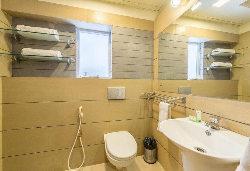 Отель Treebo Nestlay Airport Alandur