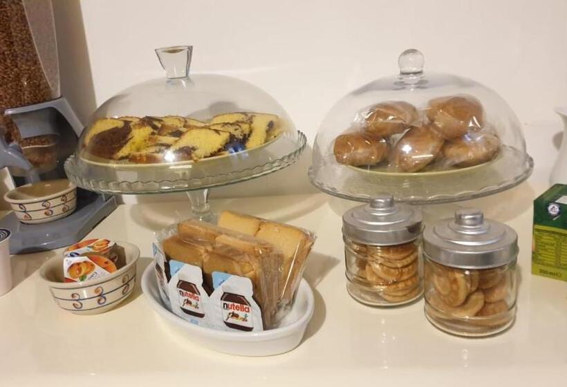 تختخواب و صبحانه Aduepassi