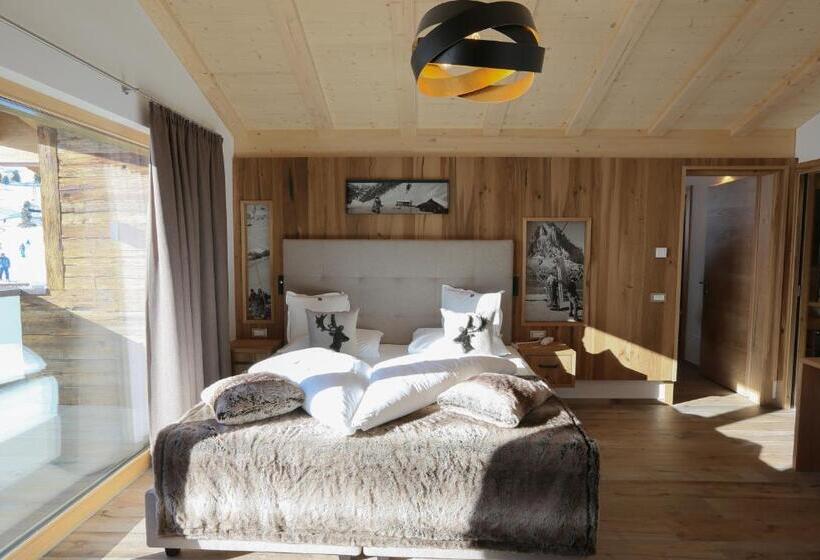 Отель Passo Sella Dolomiti Mountain Resort