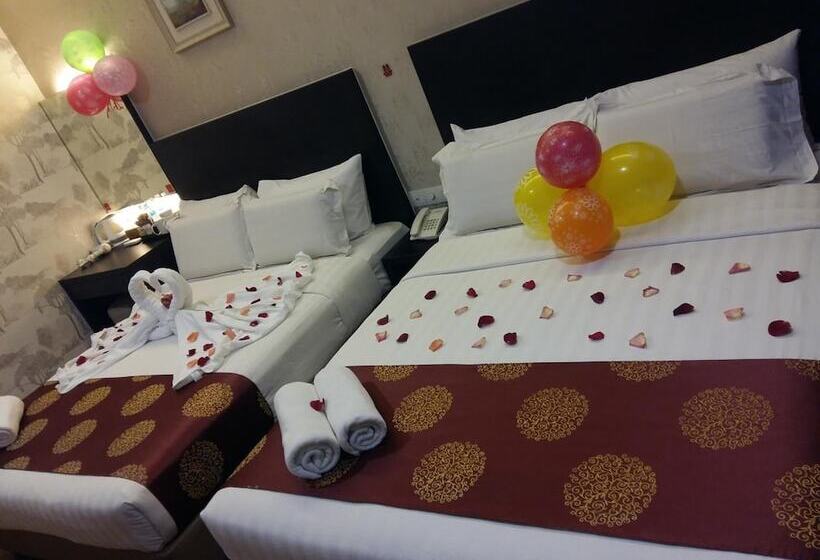 فندق Capital O 91074 Grand World