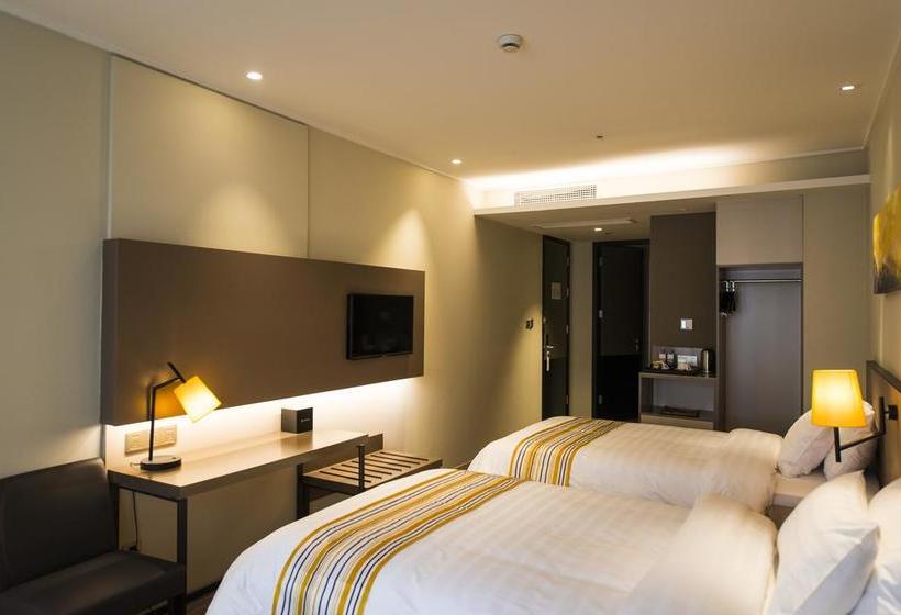 Отель Home Inn Plus Shanghai Huaihai Road Sinan Road