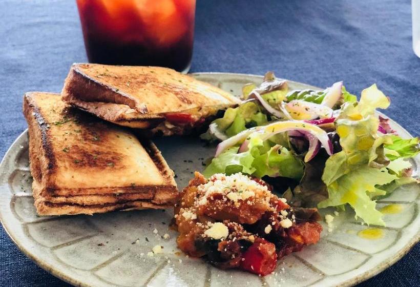 فندق Canaan Coffee &