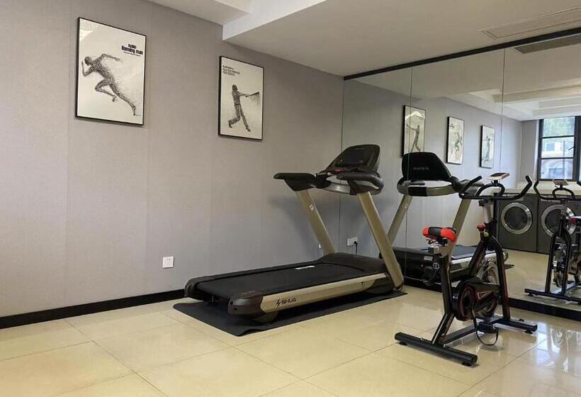 维也纳国际酒店上海浦东机场自贸区店一提供浦东机场和迪士尼免费班车接送