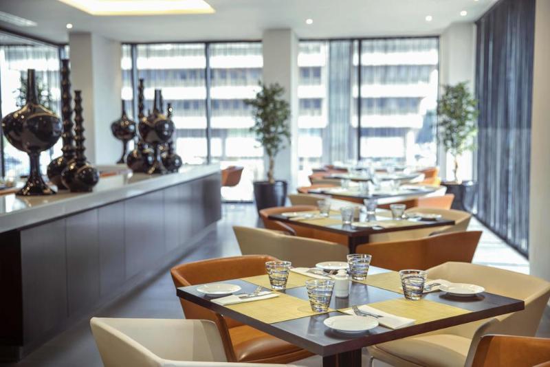 Отель Centro Waha By Rotana