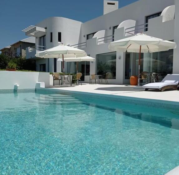 هتل Posada De Los Pajaros