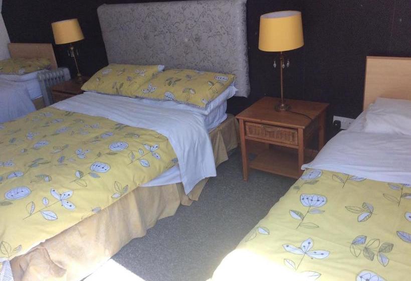 مبيت وإفطار Coach House Suites