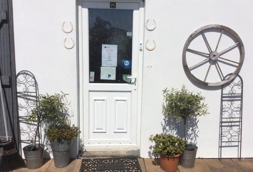 ベッドアンドブレックファースト Coach House Suites