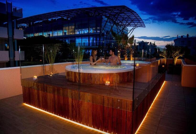 Отель Metropol Ceccarini Suite Luxury Apartments