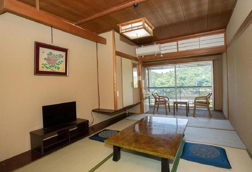 בית מלון כפרי Okukujikan