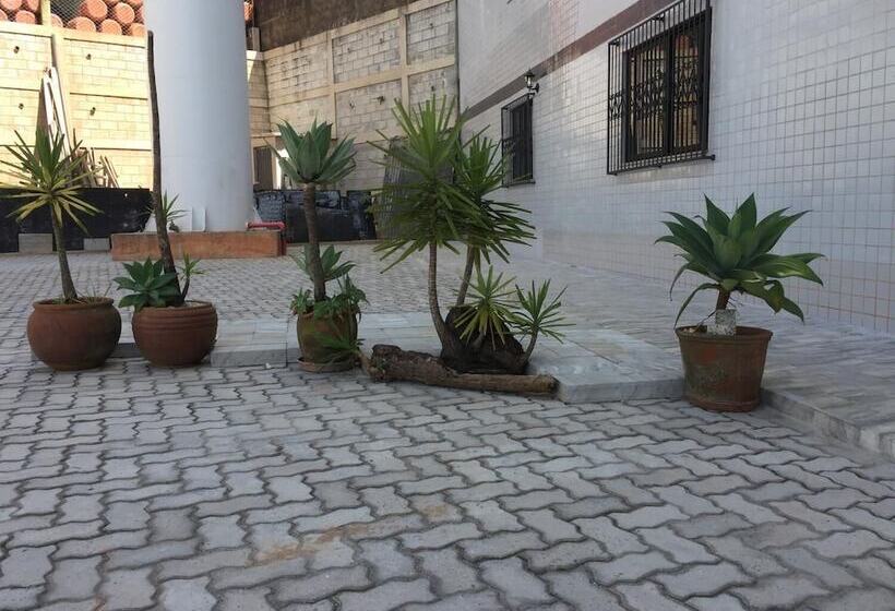 Отель Village Plaza