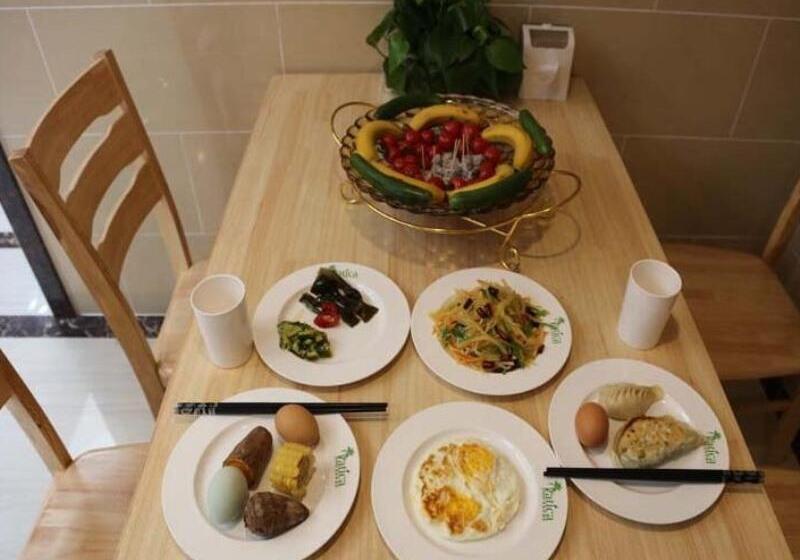 ホテル Vatica Qingdao Licang Xiazhuang Hexie Plaza