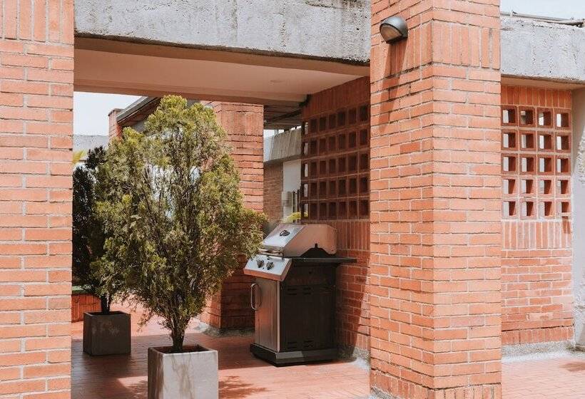 Отель Travelers Orange Suites