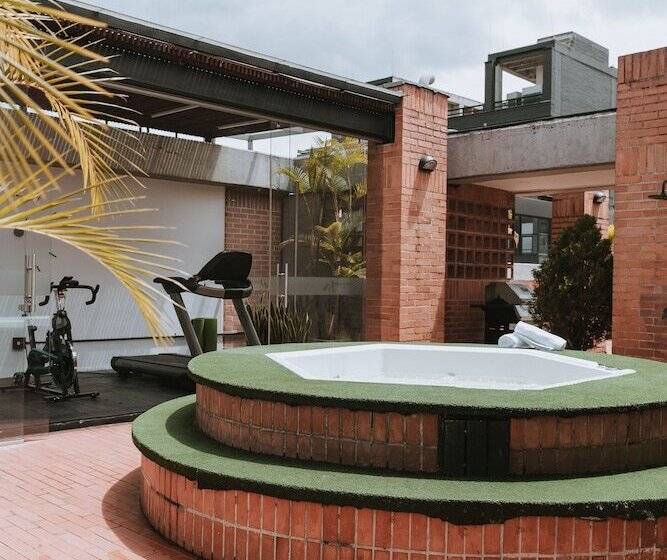 Отель Travelers Orange Suites