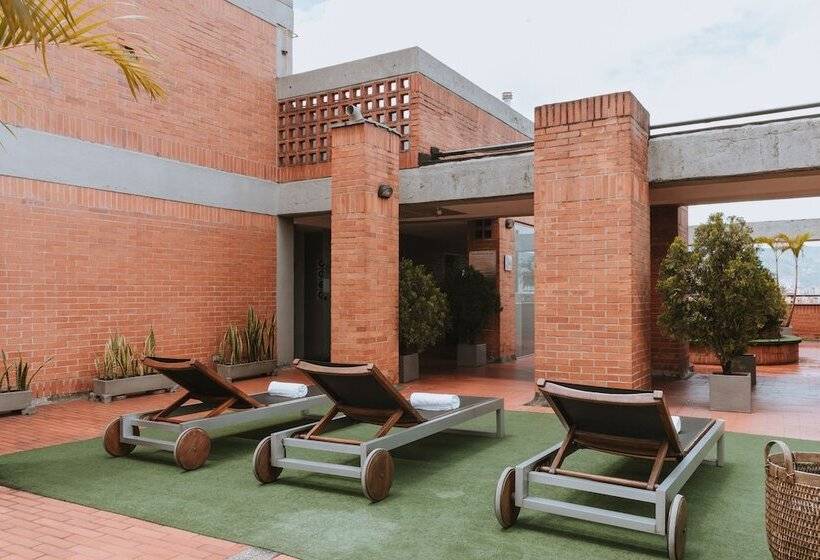 Отель Travelers Orange Suites