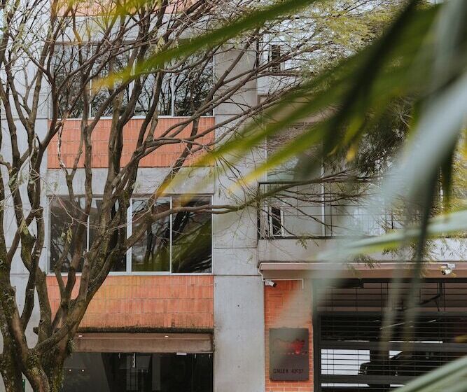 Отель Travelers Orange Suites