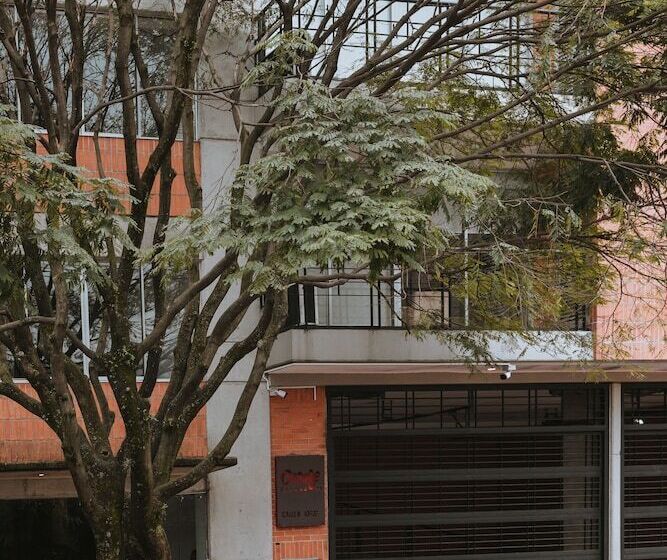 Отель Travelers Orange Suites