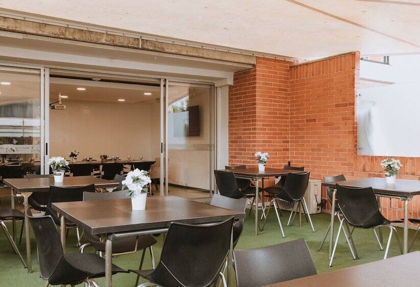 Отель Travelers Orange Suites