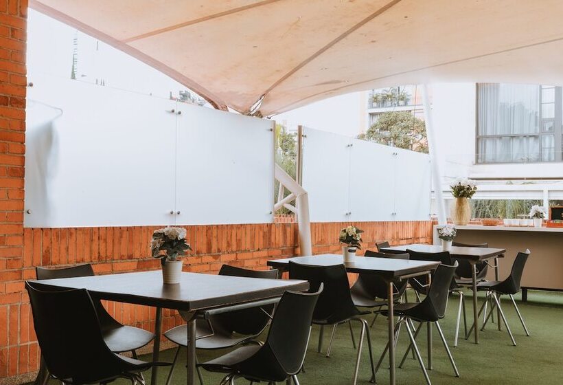 Отель Travelers Orange Suites