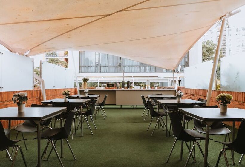 Отель Travelers Orange Suites