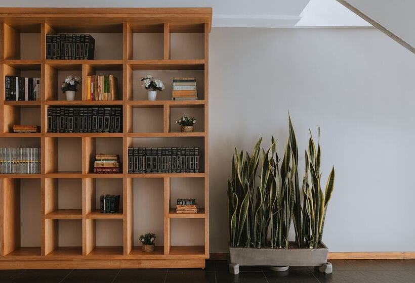 Отель Travelers Orange Suites