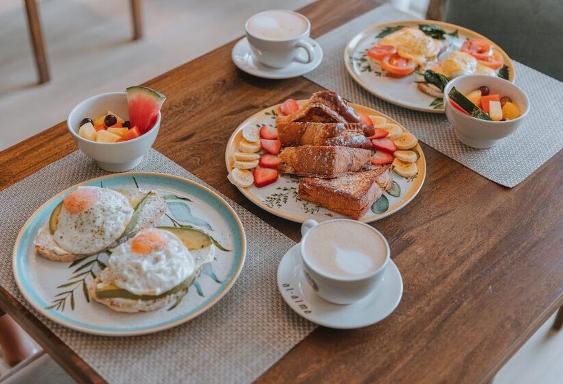 Отель Travelers Orange Suites