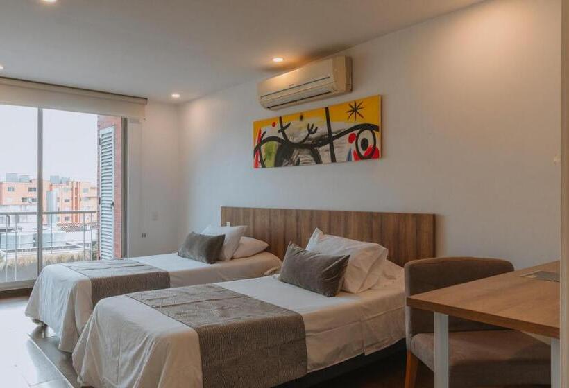 Отель Travelers Orange Suites