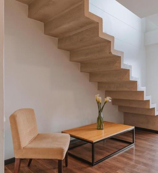 Отель Travelers Orange Suites