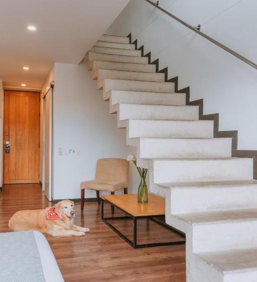 Отель Travelers Orange Suites