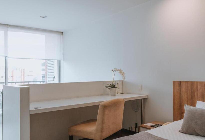 Отель Travelers Orange Suites