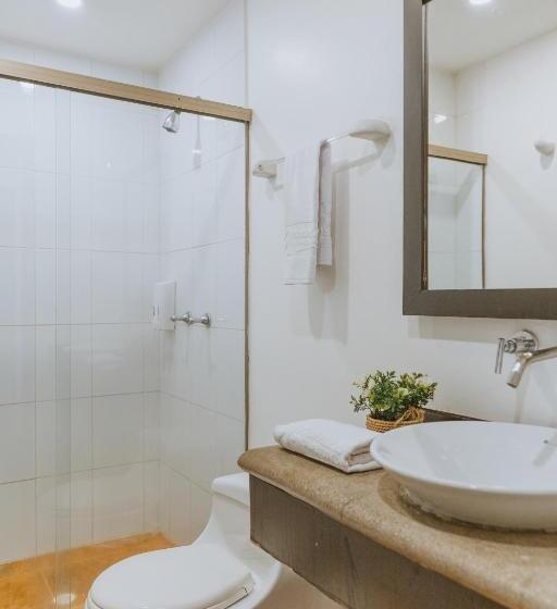 Отель Travelers Orange Suites