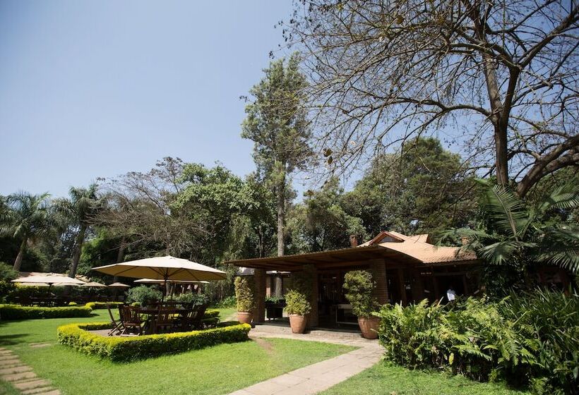 Отель Elewana Arusha Coffee Lodge