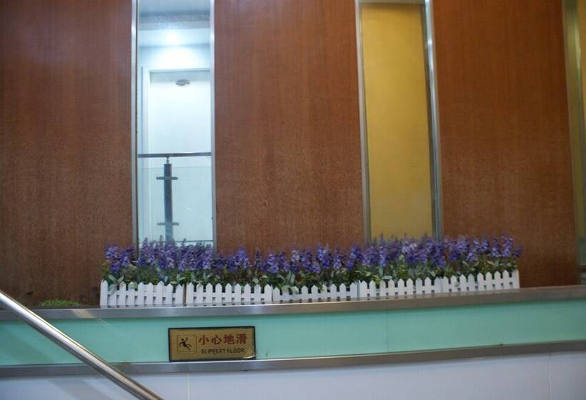 Отель Yixin Business