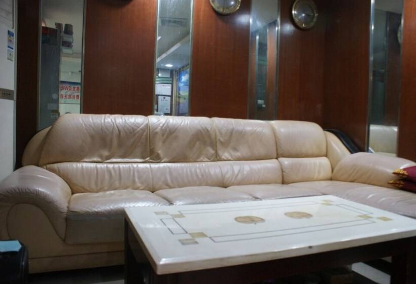 Отель Yixin Business