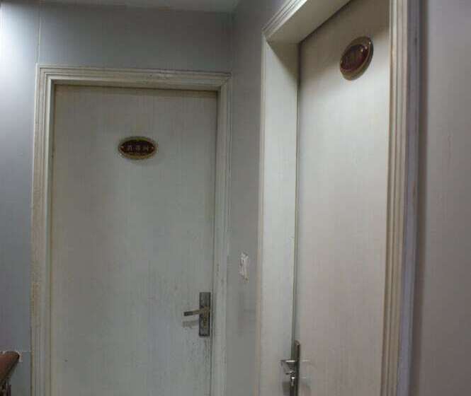 Отель Yixin Business