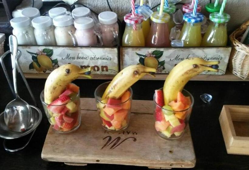 Отель Glenda's Guest Suites