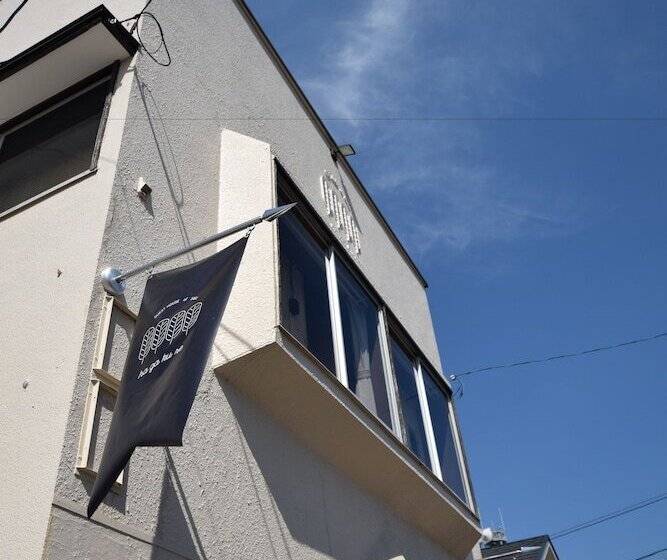 Отель Saga International Guesthouse Hagakure