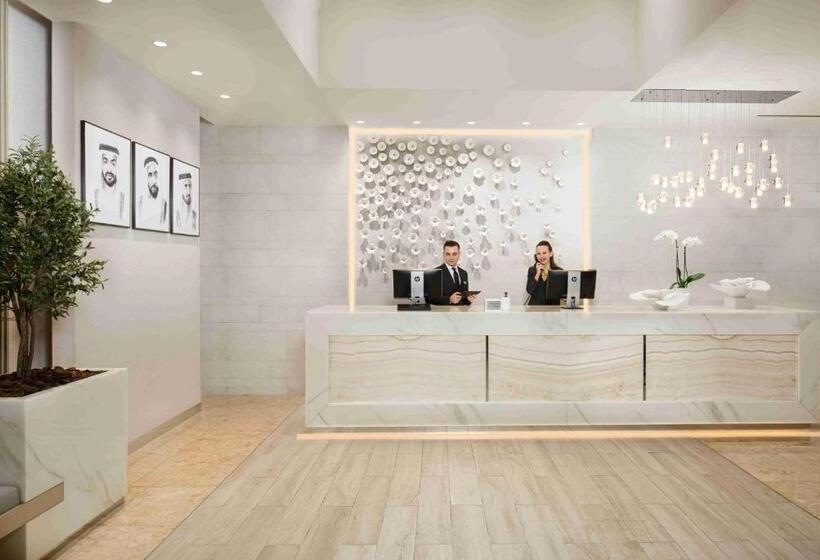 Отель Beach Rotana – All Suites