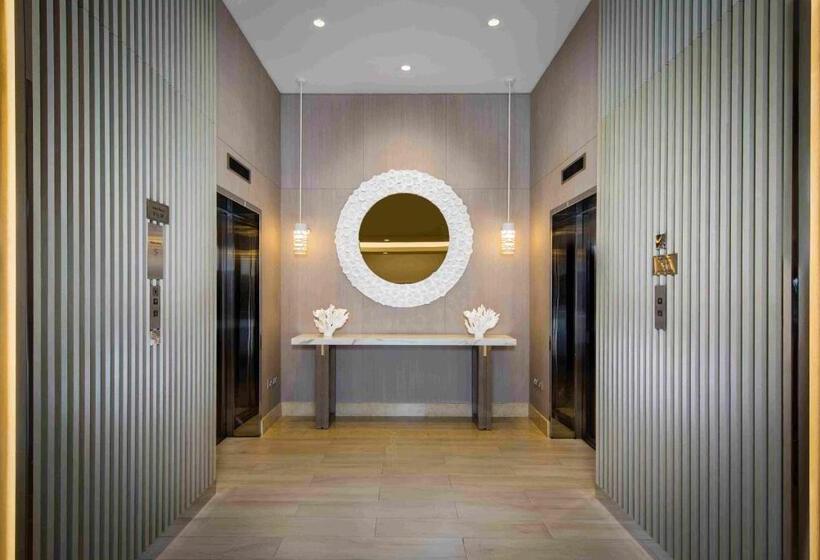 Отель Beach Rotana – All Suites