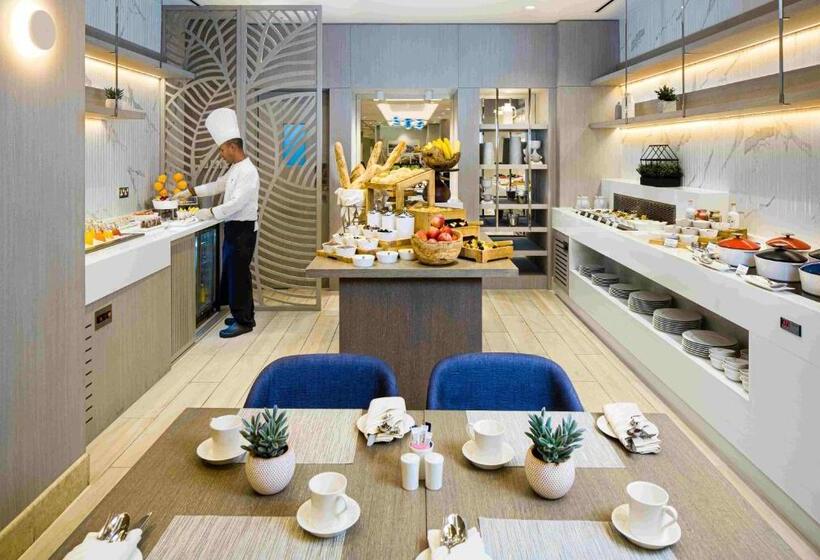 Отель Beach Rotana – All Suites