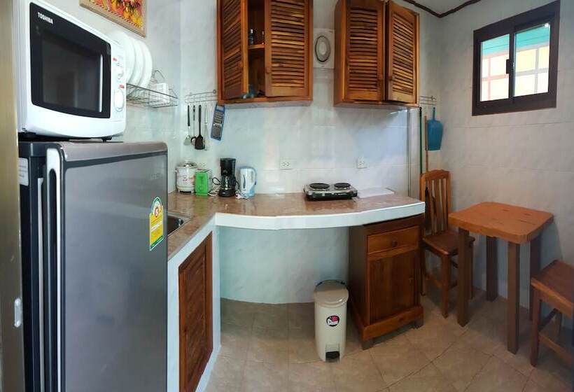 호텔 New Paradise Home Resort