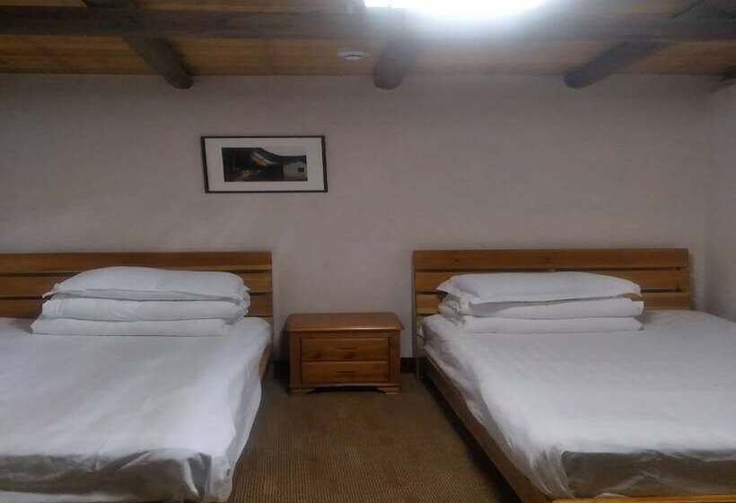 Nanjing Tulou Qingdelou Inn