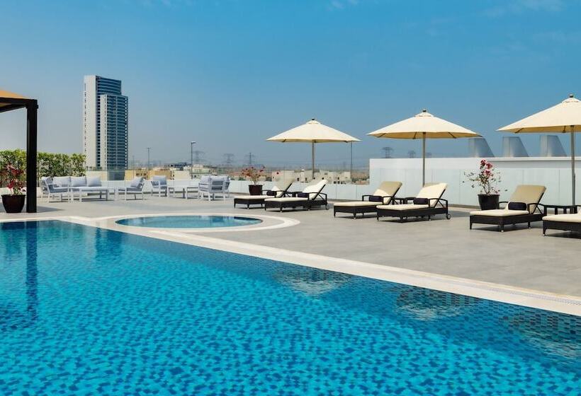 Отель Four Points By Sheraton Production City, Dubai