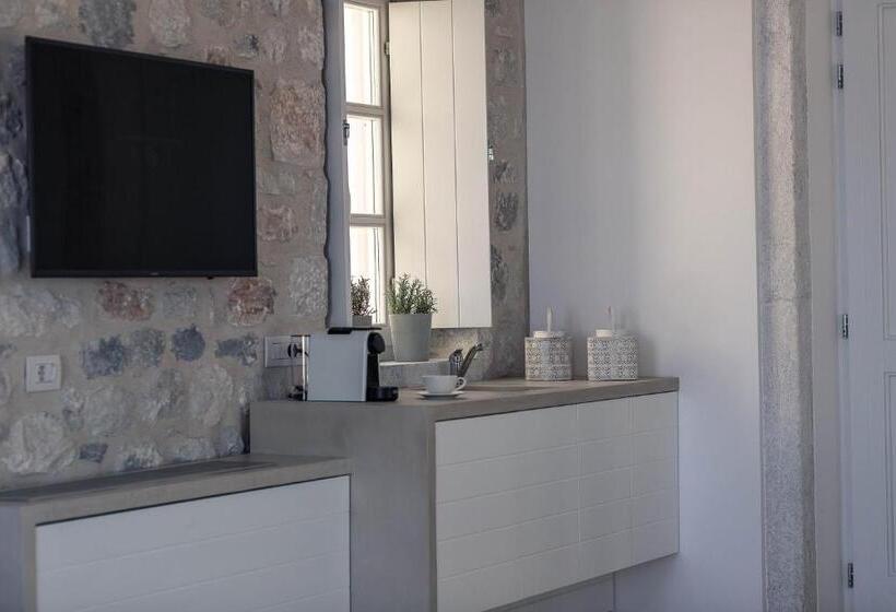 Отель Ariá Estate Suites & Spa